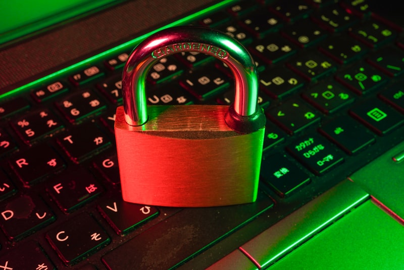 A padlock resting on a computer keyboard, representing data privacy